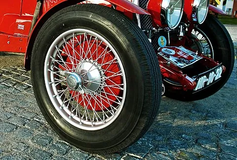 wire wheel: a wheel having a central hub connected to the rim by wire spokes, formerly in common use on...