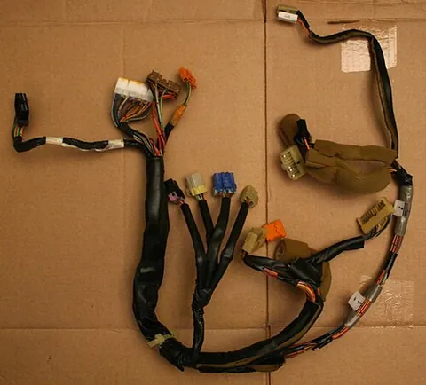 wiring harness: a bundle of insulated wires, often held together with straps or other connectors, that transmit...
