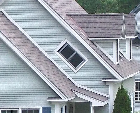 witch window: a window placed diagonally, with its long edge parallel to the roof, in the gable-end wall of a...
