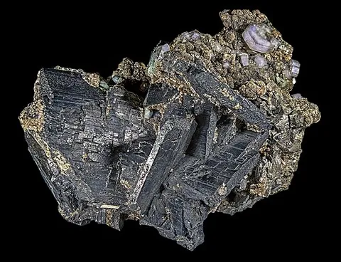 wolframite: a mineral that consists of a tungstate of iron and manganese; (Fe,Mn)WO₄; it is one of the...
