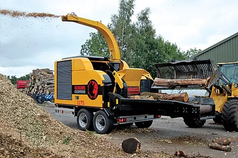 woodchipper: a machine for reducing wood to woodchips
