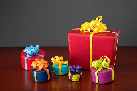 wrapping paper: paper used for wrapping parcels (in this case, often brown) or presents (in this case, often...