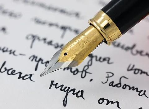 write: to form letters, words or symbols on a surface in order to communicate