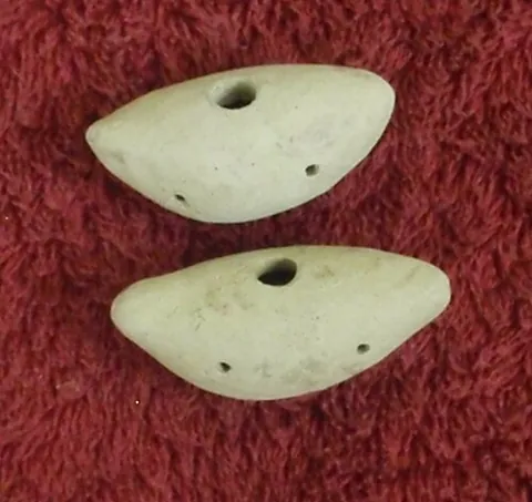 xutuli: an Indian vessel flute made from clay or bamboo, used in the Rongali Bihu festival