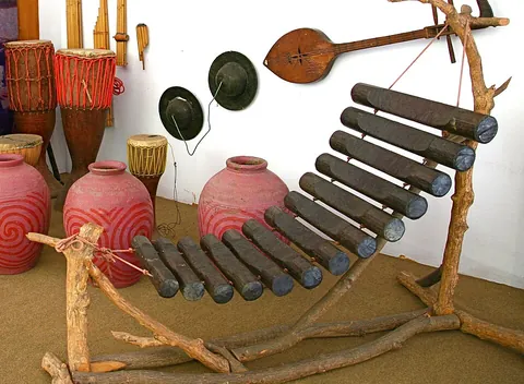 xylophone: any musical instrument (percussion idiophone) made of wooden slats graduated so as to make the...