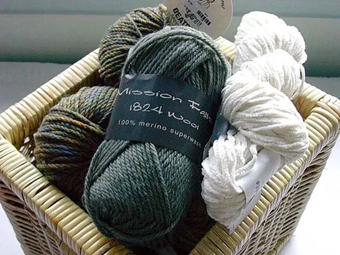 yarn: a twisted strand of fibre used for knitting or weaving