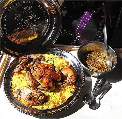 yassa: a spicy Senegalese dish of marinated meat poultry, fish, or lamb with onions, lemon, or mustard