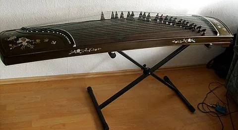 yatga: a traditional plucked bridge zither played in Mongolia