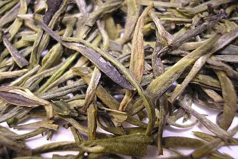 yellow tea: a Chinese tea produced in a similar manner to green tea but with the added steps of encasing and...