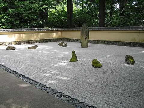 zen garden: a small stylized Japanese rock garden, intended to convey the essence of nature and to aid...