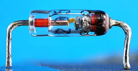 zener diode: a semiconductor junction device through which current flows normally in the forward direction, and...