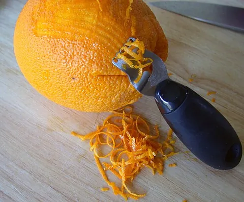 zester: a kitchen implement used to remove the zest of citrus fruit