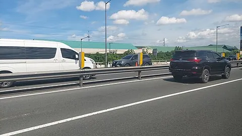 zipper lane: a temporary highway lane (usually demarcated with traffic cones) on the opposite side wherein...