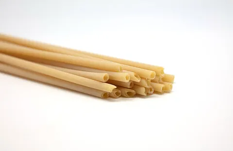 ziti: a type of macaroni pasta in the form of long smooth hollow tubes