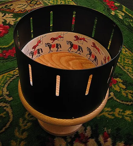 zoetrope: an optical toy, in which figures made to revolve on the inside of a cylinder, and viewed through...