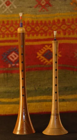 zurna: a double-reed outdoor wind instrument, usually accompanied by a davul (bass drum) in Anatolian folk...